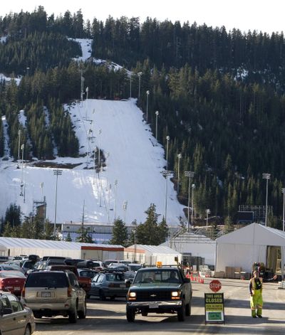 A closed sign is up, but officials say the Olympic venues at Cypress Mountain will be ready in time. (Associated Press)