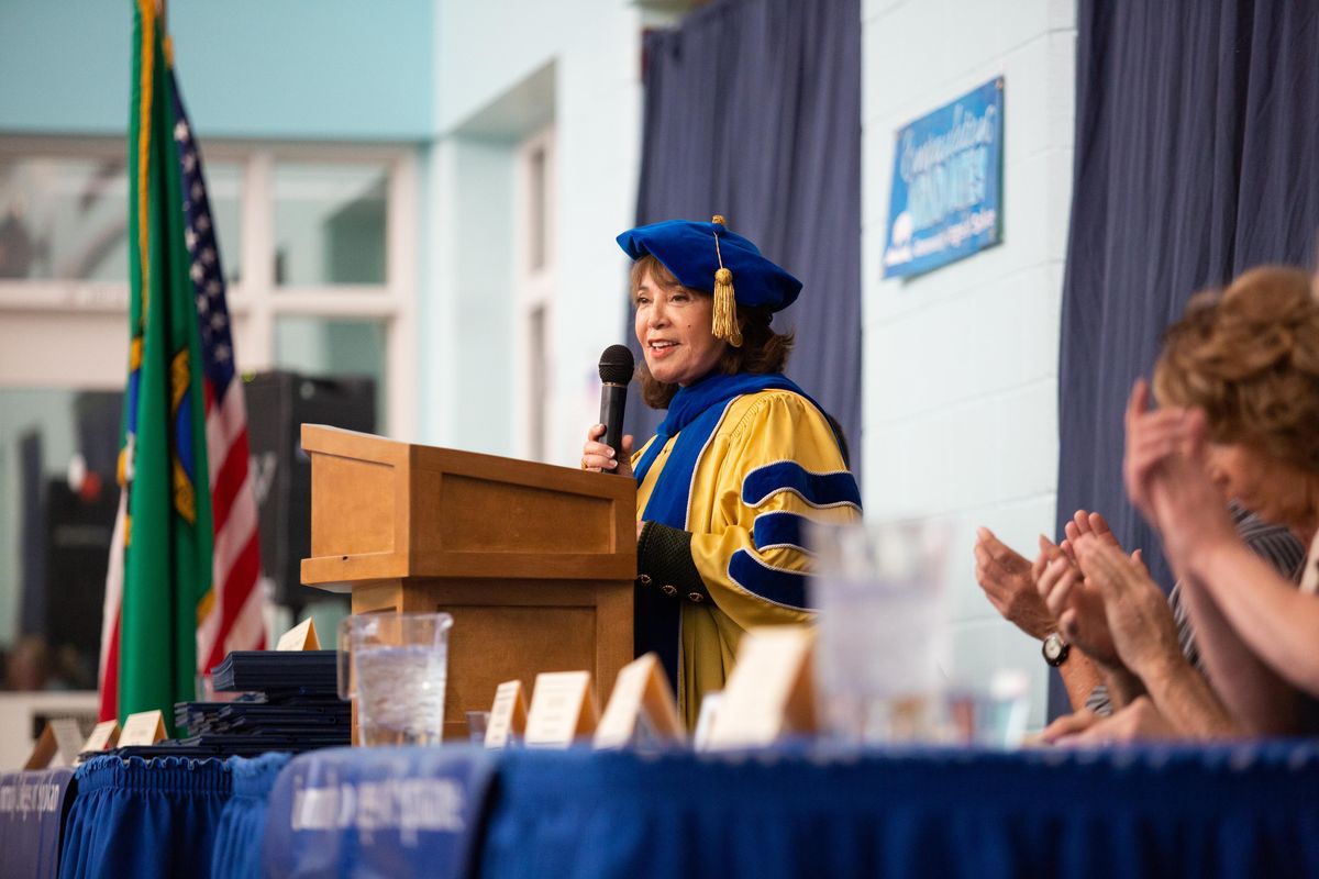Christine Johnson, chancellor of the Community Colleges of Spokane, speaks during a commencement ceremony at Airway Heights Corrections Center on Thursday, April 25, 2019. Students earned diplomas for GED, vocational and associate degree programs while incarcerated. (Libby Kamrowski / The Spokesman-Review)