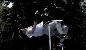 Timberlake High School junior Travis Porter attempts the high jump during practice at the school near Spirit Lake on April 16. He hopes to clear 6-4 this season. (Kathy Plonka / The Spokesman-Review)