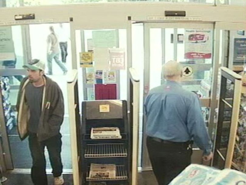 Surveillance photo from the June 16 robbery at Walgreens, 2105 E Wellesley Ave. (Spokane Police Department)