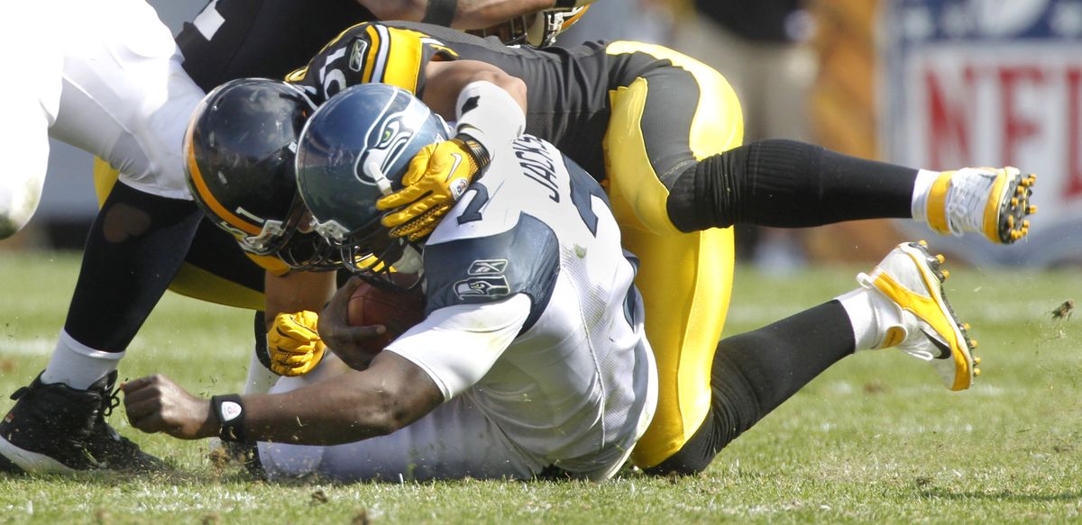 Seattle quarterback Tarvaris Jackson wasn’t sacked in the first half against Pittsburgh last Sunday, but James Farrior got to him in the fourth quarter. (Associated Press)