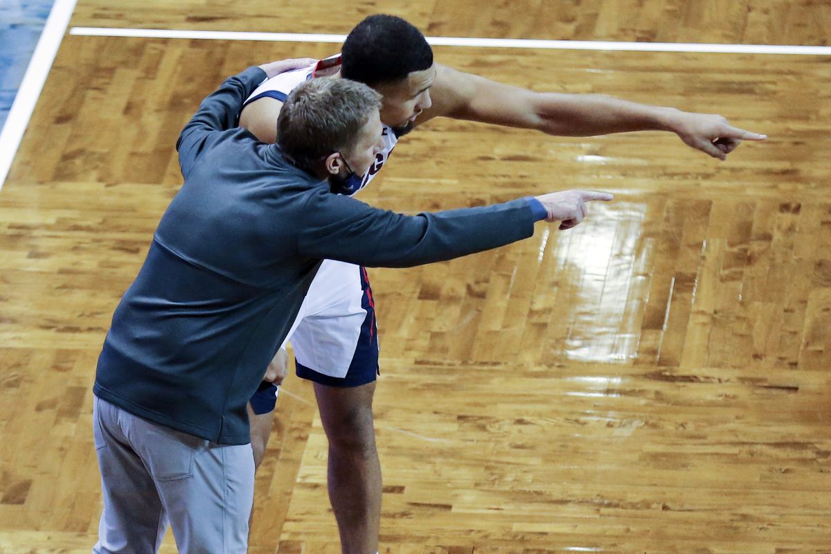 Gonzaga guard Jalen Suggs (1) and head coach Mark Few discuss strategy during the second half of an NCAA college basketball game against Iowa, Saturday, Dec. 19, 2020 in Sioux Falls, S.D.   (Associated Press)