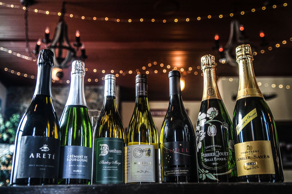 A lineup of wines recommended by wine steward Noelle Otersen Laparco from Candle in the Woods in Athol on Thursday.  (Kathy Plonka/The Spokesman-Review)
