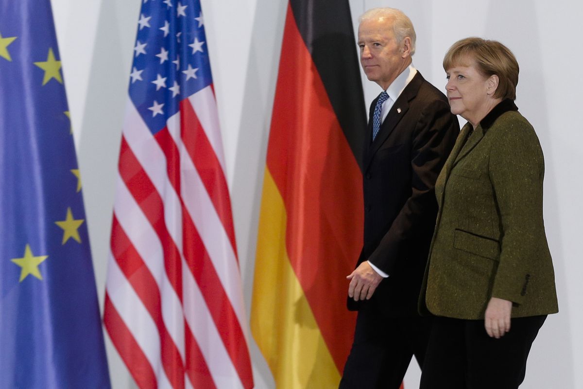 German Chancellor Angela Merkel, right, and then-United States Vice President Joe Biden are seen Feb. 1, 2013, at the chancellery in Berlin, Germany.  (Markus Schreiber)