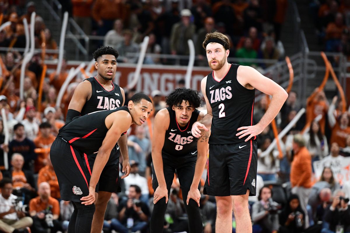 Gonzaga Bulldogs guard Nolan Hickman (11), guard Malachi Smith (13), guard Julian Strawther (0) and forward Drew Timme (2) react during the second half of a college basketball game on Wednesday, Nov. 16, 2022, in the Moody Center in Austin, TX. Texas won the game 93-74.  (Tyler Tjomsland/The Spokesman-Review)