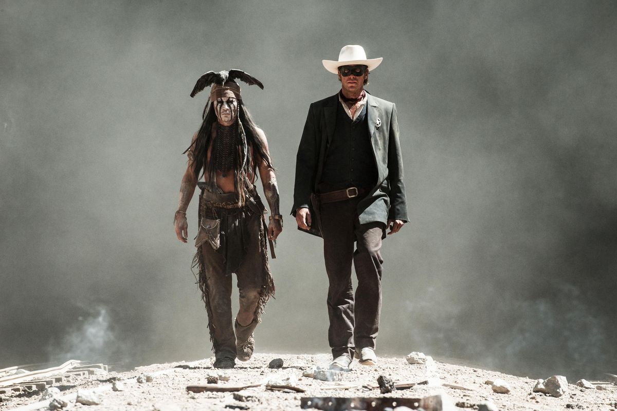 This undated publicity photo released by Disney and Jerry Bruckheimer, Inc. shows Johnny Depp, left, as Tonto, and Armie Hammer, as The Lone Ranger, in a scene from the film, "The Lone Ranger."  (AP Photo/Disney/Jerry Bruckheimer, Inc., Peter Mountain, File) ORG XMIT: NYET511 (Peter Mountain / AP)