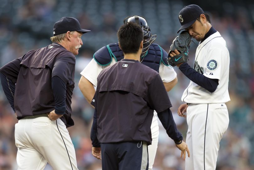 The return of Hisashi Iwakuma, right, was nothing to write home about, but the Mariners bullpen was even less impressive. (Associated Press)