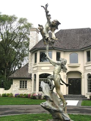 Dance of Sun and Moon statue by Jerry McKellar shown in a different location. 