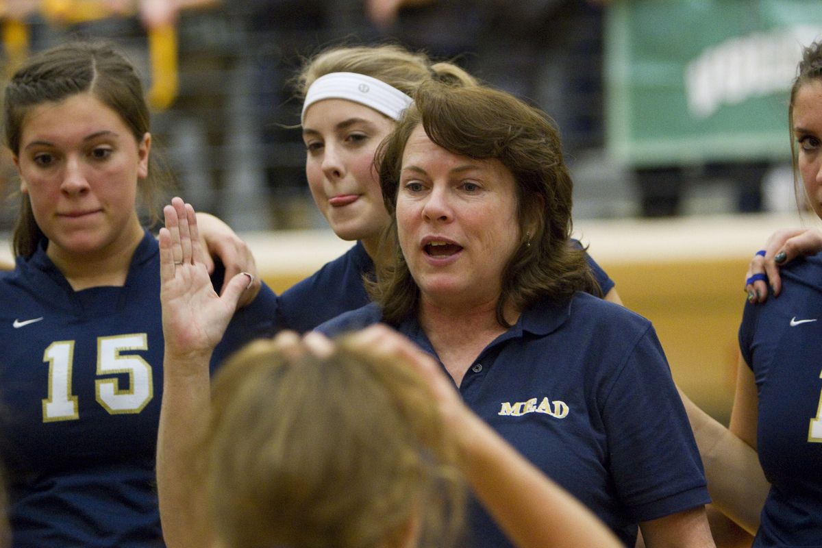 Mead volleyball coach Judy Kight directs her team for the final time Saturday. (Patrick Hagerty)