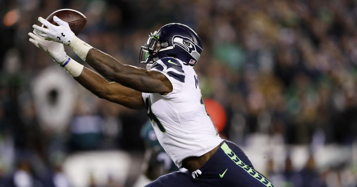 D.K. Metcalf, Seahawks coach Pete Carroll were shirtless the first