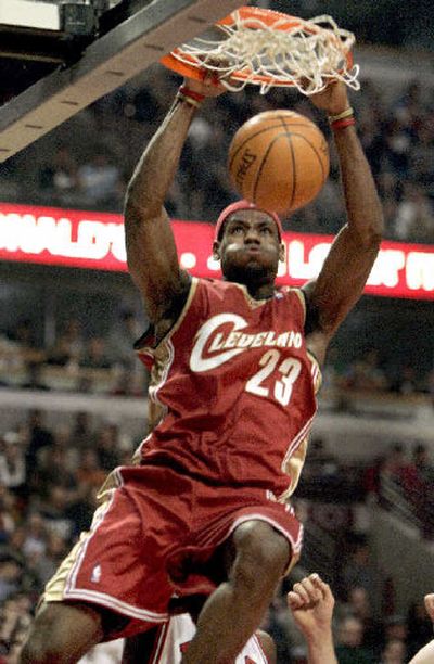 
Cleveland forward LeBron James dunks for two of his 37 points against Chicago. 
 (Associated Press / The Spokesman-Review)