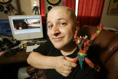 
Voice artist Daniel Geduld poses with a Beast Man action figure from the Masters of the Universe cartoon series. Associated Press
 (Associated Press / The Spokesman-Review)