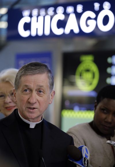 Incoming Chicago Archbishop Blase Cupich speaks at a news conference at O'Hare International Airport in Chicago on Thursday. (Associated Press)