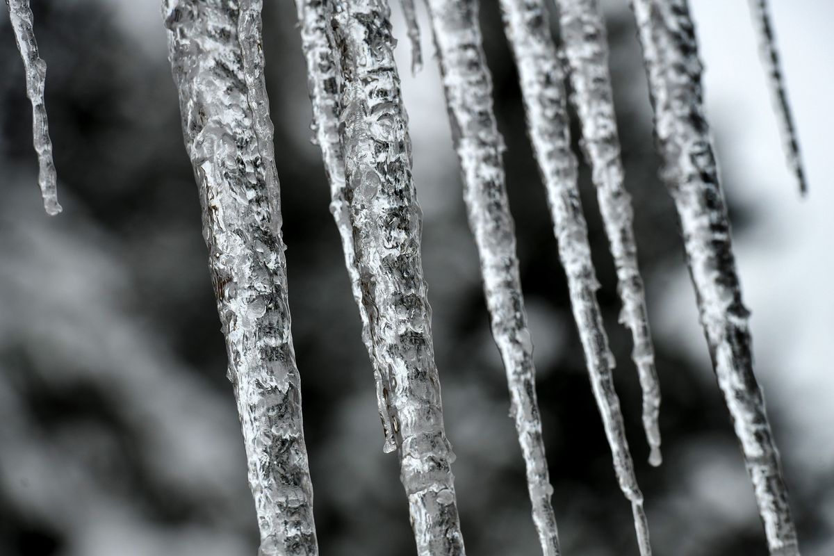 Icicles form on a home in Hauser on Monday, Dec. 20, 2021.  (Kathy Plonka/The Spokesman-Review)