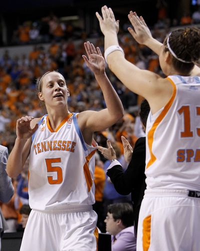 Tennessee's Angie Bjorklund (5) is congratulated as she leaves the game late in the second half of Tennessee's 90-65 win over Kentucky in an NCAA college basketball game for the championship of the Southeastern Conference tournament on Sunday, March 6, 2011, in Nashville, Tenn. Bjorklund scored 23 points for Tennessee. (Mark Humphrey / Associated Press)