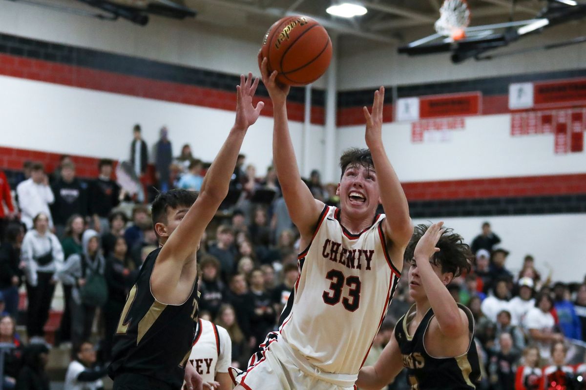 Cheney’s Evan Stinson moves to the hoop against visiting University on Tuesday.  (CHERYL NICHOLS/For The Spokesman-Review)