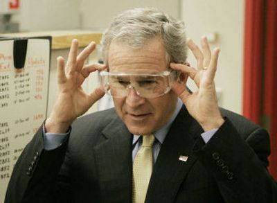 
President Bush tours the Johnson Control Battery Technology Center in Glendale, Wis., on Monday. 
 (Associated Press / The Spokesman-Review)