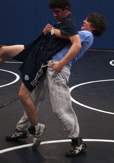 
Cambron gets the upper hand with a teammate.
 (The Spokesman-Review)