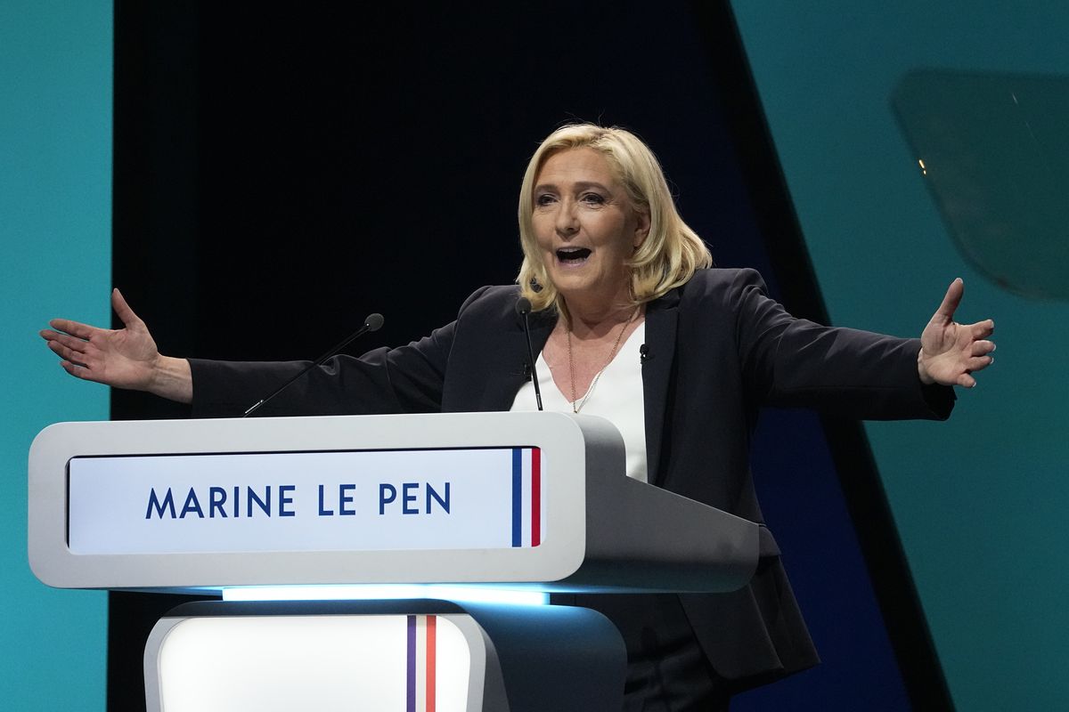 French far-tight leader Marine Le Pen delivers her speech during a campaign rally, Saturday, Feb. 5, 2022 in Reims, eastern France. France