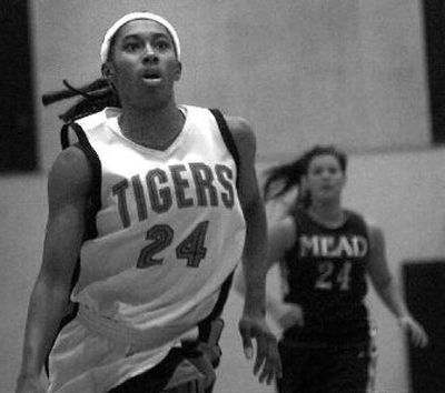 
Brittany Kennedy did it all for Lewis and Clark against Mead on Thursday night. 
 (Jed Conklin / The Spokesman-Review)