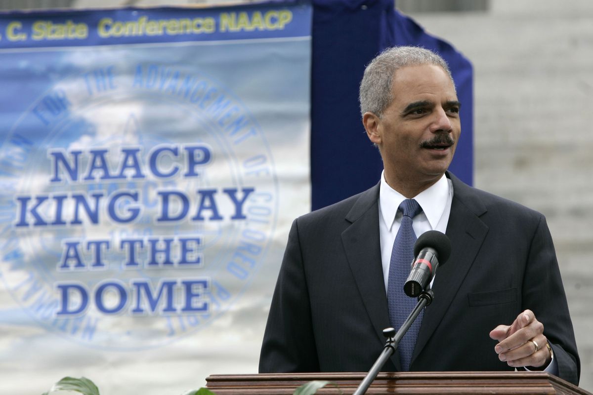 U.S. Attorney General Eric Holder addresses the crowd during a rally at the Statehouse in Columbia, S.C. (Associated Press)