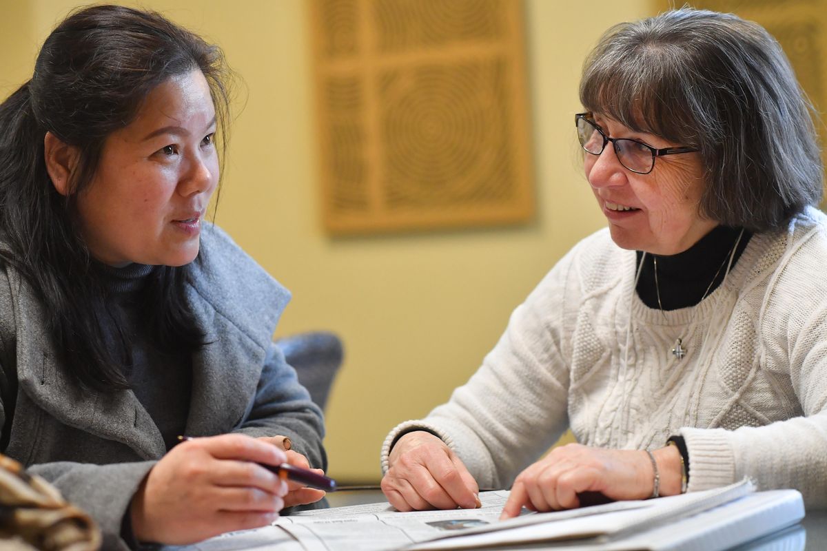 Hanna Wang, left, who came to the U.S. from China four years ago, takes English lessons from Yvonne Rentner, a volunteer instructor, at the Barton School at First Presbyterian Church on Wednesday, Feb. 27, 2019, in downtown Spokane, Wash. (Tyler Tjomsland / The Spokesman-Review)