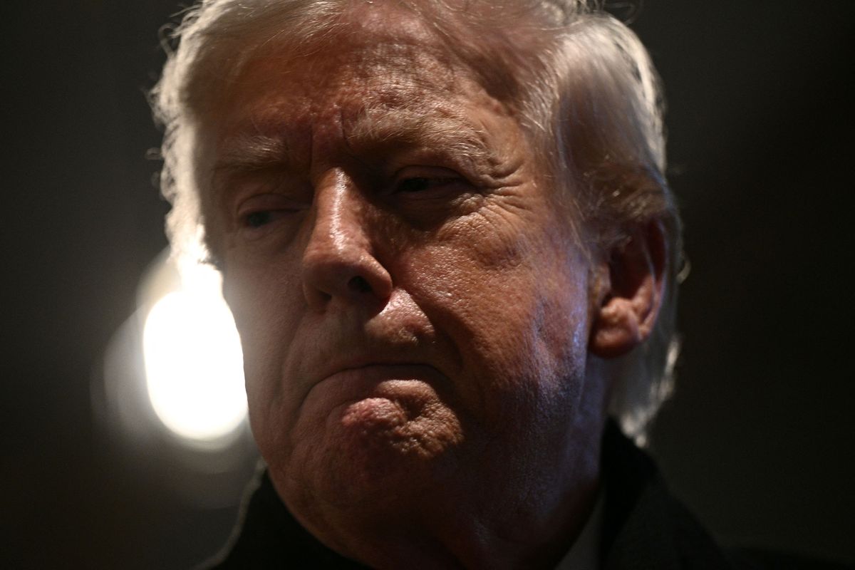 President Donald Trump speaks during a stop at the Machine Shed restaurant Tuesday in Urbandale, Iowa.  (Brendan Smialowski/AFP/Getty Images North America/TNS)