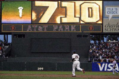 
 Barry Bonds circles the bases after hitting 710th career home run against the Mets.
 (Associated Press / The Spokesman-Review)