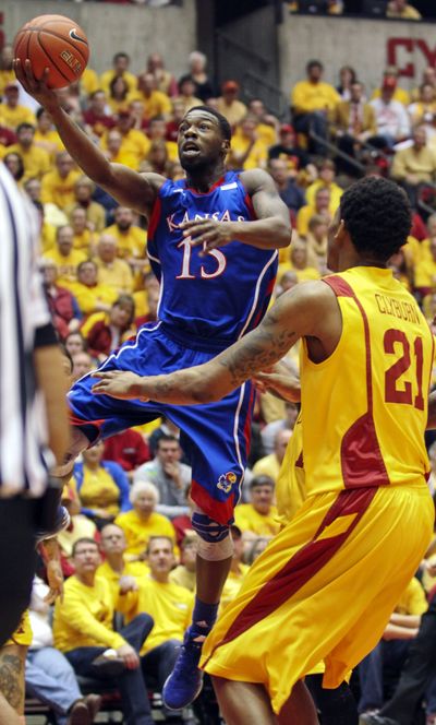 Kansas guard Elijah Johnson scored 39 points in overtime victory. (Associated Press)