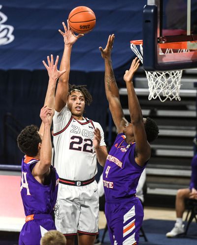 GU’s Anton Watson splits Northwestern State’s Robert Chougkaz and Kendal Coleman on Monday at the McCarthey Athletic Center.  (Dan Pelle/THESPOKESMAN-REVIEW)