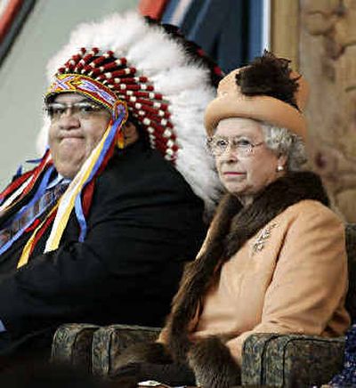 
Queen Elizabeth II visits with Chief Alphonse Bird at First Nation University on Tuesday in Regina, Sask. 
 (Associated Press / The Spokesman-Review)