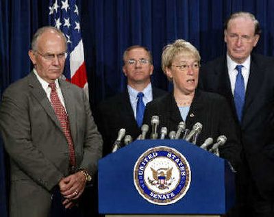 Sen. Patty Murray, D-Wash., briefs the media with Sen. Larry Craig, left, R-Idaho, chairman of the U.S. Senate Committee on Veteran's affairs, and Sen. John Rockefeller, right, D-W.Va., during a news conference Thursday on Capitol Hill.
(Associated Press / The Spokesman-Review)
