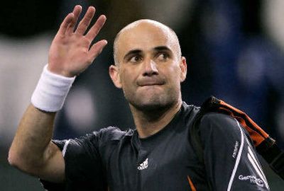 
Andre Agassi will wave goodbye to tennis after this year's U.S. Open tournament.
 (Associated Press / The Spokesman-Review)