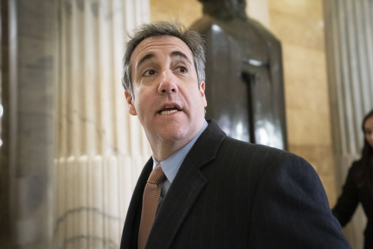 FILE - In this March 6, 2019 file photo, Michael Cohen, President Donald Trump's former lawyer, returns to testify on Capitol Hill in Washington. President Donald Trump's former personal lawyer has sued Attorney General William Barr and the Bureau of Prisons director, saying he's being unjustly held behind bars to stop him from finishing a book that criticizes Trump. The lawsuit on behalf of Michael Cohen was filed late Monday, July 20, 2020 in Manhattan federal court,  (J. Scott Applewhite)