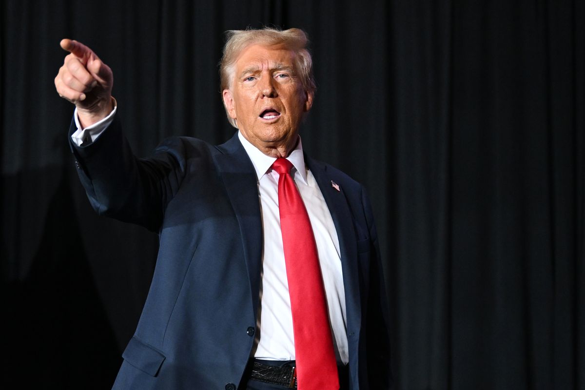 Donald Trump dances during a campaign rally on Oct. 21 at Gaylord Rockies Resort in Aurora, Colo. (RJ Sangosti)