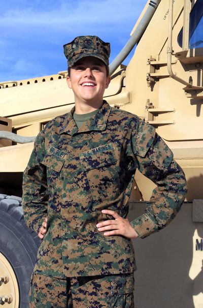 This Nov. 29, 2012 image provided by the United states Marine Corps shows Lt. Brandy Soublet on the Marine base, 29 Palms in Southern California. Soublet is about as far from the war front as possible at her desk in the California desert, but she's on the front lines of an experiment that could one day put women as close to combat as their male peers. The Penfield, N.Y. woman is one of 45 female Marines assigned this summer to 19 all-male combat battalions. (Cpl. Jackson / Usmc)