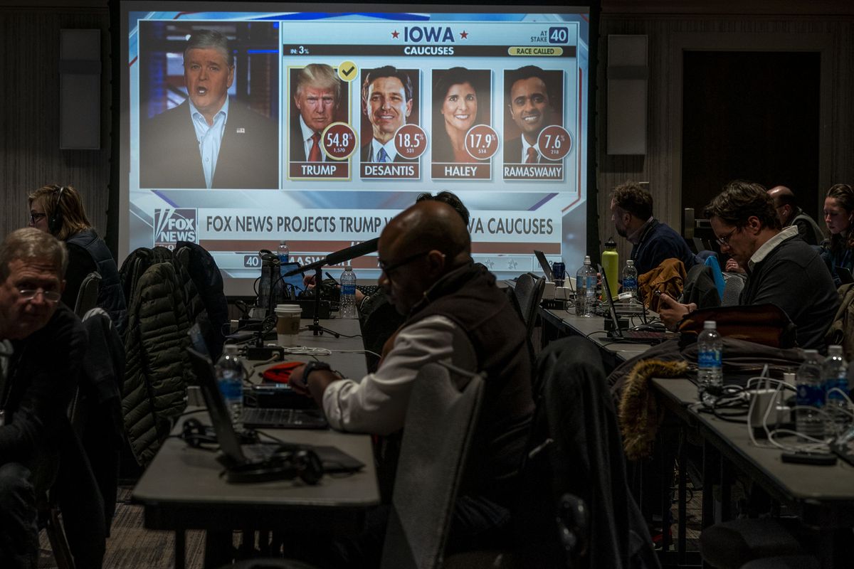 Election results appear in the pressroom at the Republican Presidential candidate Nikki Haley party in Des Moines on Monday.    (Melina Mara/The Washington Post)