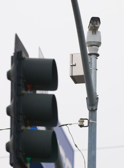 A traffic monitoring camera faces north on Washington Street at Third Avenue.  (Colin Mulvany / The Spokesman-Review)