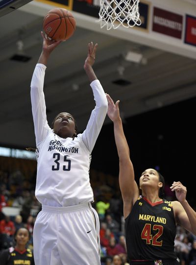 Jonquel Jones averages double-double for GW. (Associated Press)