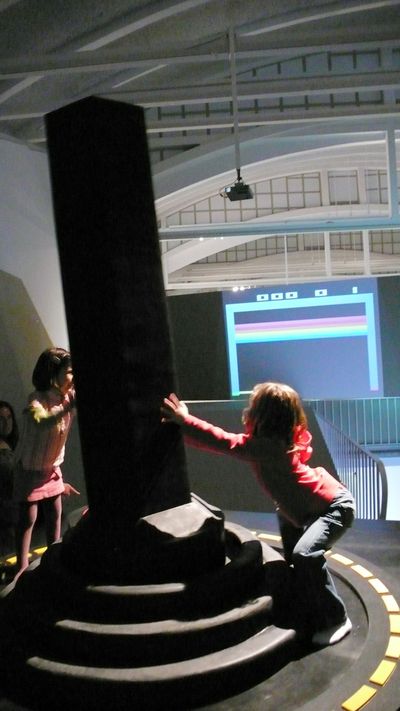 Two girls operate the Giant Joystick at LABoral Art and Industrial Creation Centre in 2007 in Asturias, Spain.  (Mary Flanagan)
