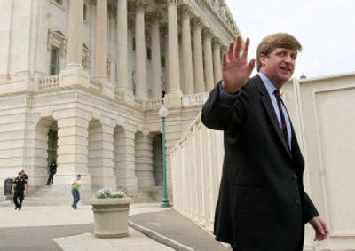 
Rep. Patrick Kennedy, D-R.I. waves Friday on Capitol Hill after announcing he was seeking treatment for addiction to pain medication, following a car crash earlier in the week. 
 (Associated Press / The Spokesman-Review)