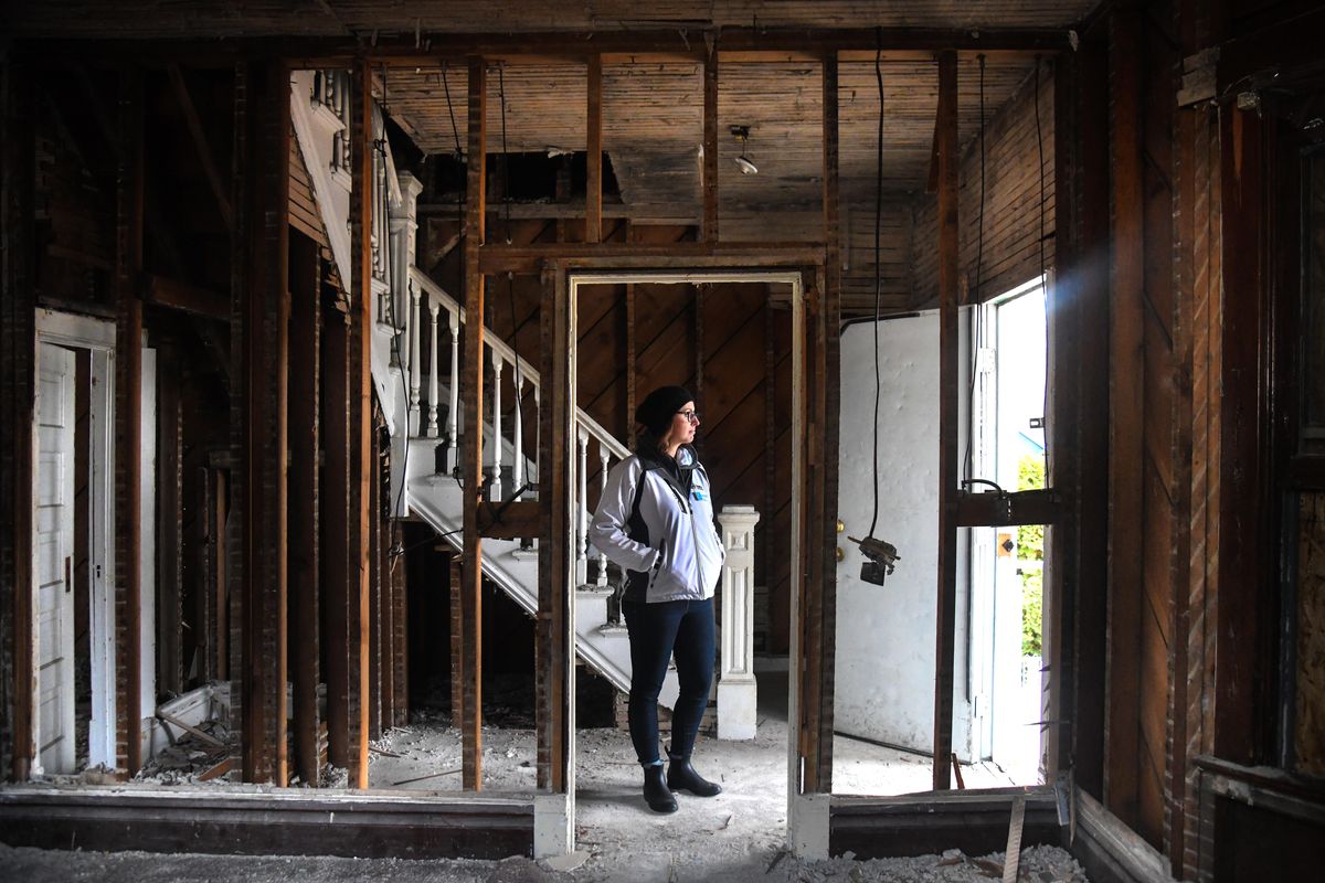 Habitat for Humanity CEO Michelle Girardot pauses during a tour of a derelict house at 1823 W. Sharpe Ave. on Tuesday, Dec. 3, 2019. Habitat for Humanity plans to rehabilitate the house and sell it to a low-income family through the nonprofit’s Derelict Housing Acquisition and Homeownership Program. (Dan Pelle / The Spokesman-Review)