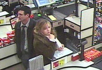
Sheriff's detectives hope someone  can identify this man and woman suspected  of forging checks at 40 businesses. Anyone with information is asked to call (509) 242-8477.  
 (Photo courtesy of Sheriff's Office / The Spokesman-Review)