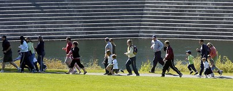 Cildren and adults make their way along the Spokane River during the 1.2 mile Marmot March in Riverfront Park in Spokane, Washington, May 5, 2007.  DAN PELLE The Spokesman-Review (Dan Pelle / The Spokesman-Review)