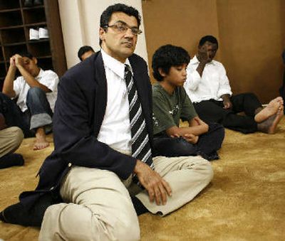 
Salim Al-Marati attends services at a mosque in the Islamic Center of Southern California in Los Angeles. 
 (Associated Press / The Spokesman-Review)