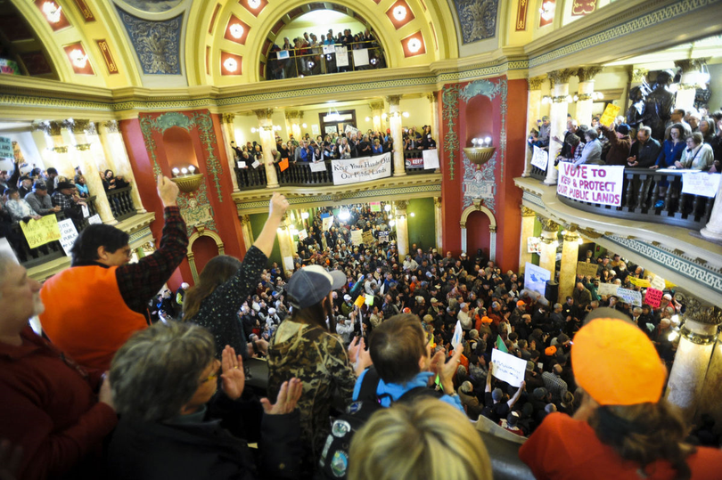 More than 1,000 demonstrators cheer during a public lands rally on the Montana Capitol rotunda on Jan. 30, 2017. (Thom Bridge / Independent Record)