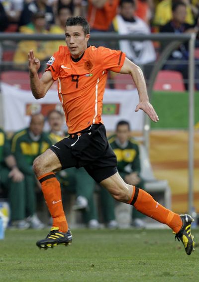 Netherlands' Robin van Persie has been cleared to play against Uruguay on Tuesday. (Associated Press)