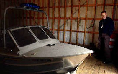 
Sgt. Matt Street of the Kootenai County Sheriff's Department talked about the need to find a new spot to house the boats from the sheriff, fire and waterways departments. The boats are currently docked on Blackwell Island. 
 (Kathy Plonka / The Spokesman-Review)