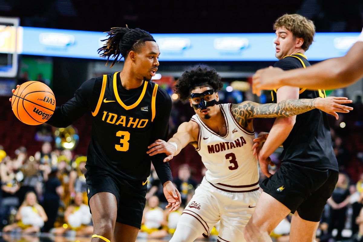 Idaho guard Biko Johnson (3) uses a screen to work past the defense of Montana guard Brooklyn Hicks (3) during the Big Sky Basketball tournament Championship matchup at the ICCU Arena in Boise, Idaho. Photo by Steve Conner  (Steve Conner)