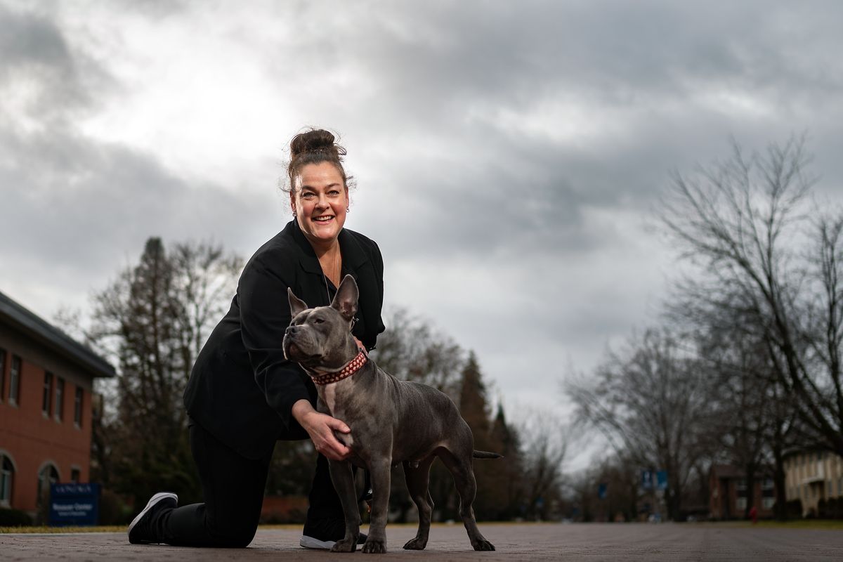 Dr. Catherine Zeisner, 50, is an assistant professor at Gonzaga University teaching students in the Department of Education Leadership and Administration. During the initial COVID-19 lockdown, Zeisner, who always strives to stay up to day on social media to keep up with her students, downloaded TikTok and began making videos about her experience as an educator. She now has over 200K followers and her page has become a gathering place for educators from across the globe to share ideas, struggle, and just relate to each other. Zeisner is a professor in residence and lives in an undergraduate residence hall with her dog Nash to help students adjust to college life.  (COLIN MULVANY/THE SPOKESMAN-REVIEW)